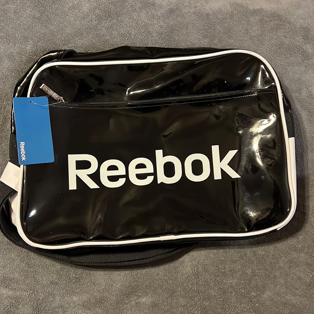 Reebok black patent book bag